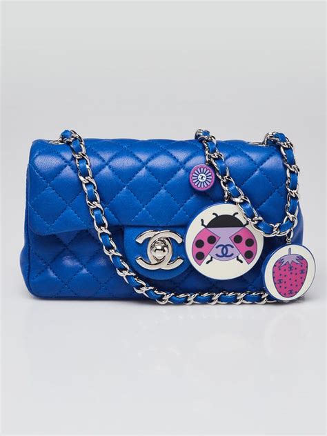 CHANEL Lambskin Quilted Ladybug Extra Mini Flap .